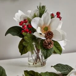 12" Magnolia, Pine & Berry Arrangement In Glass Vase 16 12" Magnolia, Pine & Berry Arrangement In Glass Vase -Christmas Designers Store D252180S 16