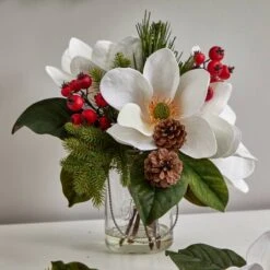 12" Magnolia, Pine & Berry Arrangement In Glass Vase 17 12" Magnolia, Pine & Berry Arrangement In Glass Vase -Christmas Designers Store D252180S 17