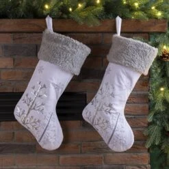 Glitzhome® 21" White Fleece With Christmas Tree & Snowflake Stocking, 2ct. 12 Glitzhome® 21" White Fleece With Christmas Tree & Snowflake Stocking, 2ct. -Christmas Designers Store D252907S 2