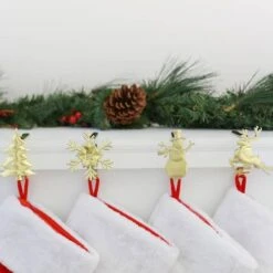 Original MantleClip® Gold Assorted Holiday Icons Stocking Holders, 4ct. 7 Original MantleClip® Gold Assorted Holiday Icons Stocking Holders, 4ct. -Christmas Designers Store D349364S 2