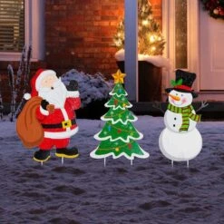 Glitzhome® 2ft. Metal Santa, Snowman & Tree Yard Stake Set 13 Glitzhome® 2ft. Metal Santa, Snowman & Tree Yard Stake Set -Christmas Designers Store D479452S 2