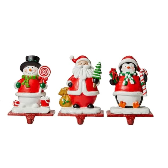 Glitzhome® 7" Santa, Snowman & Penguin Stocking Holder Set 4 Glitzhome® 7" Santa, Snowman & Penguin Stocking Holder Set - Image 2