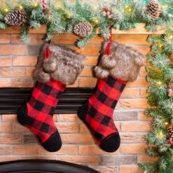 Glitzhome® 21" Black & Red Buffalo Plaid Pompom Stockings, 2ct. 12 Glitzhome® 21" Black & Red Buffalo Plaid Pompom Stockings, 2ct. -Christmas Designers Store D479589S 2