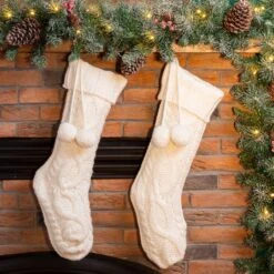 Glitzhome® 24" White Knitted Polyester Christmas Stocking With Pom Pom, 2ct. 8 Glitzhome® 24" White Knitted Polyester Christmas Stocking With Pom Pom, 2ct. -Christmas Designers Store D479601S 2