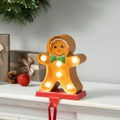Glitzhome® 7.25'' Marquee LED Gingerbread Man Christmas Stocking Holder 13 Glitzhome® 7.25'' Marquee LED Gingerbread Man Christmas Stocking Holder -Christmas Designers Store D652343S 2