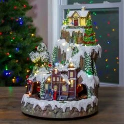 Northlight 17" White LED Lighted & Animated Christmas Village With Moving Train 10 Northlight 17" White LED Lighted & Animated Christmas Village With Moving Train -Christmas Designers Store D676293S 2