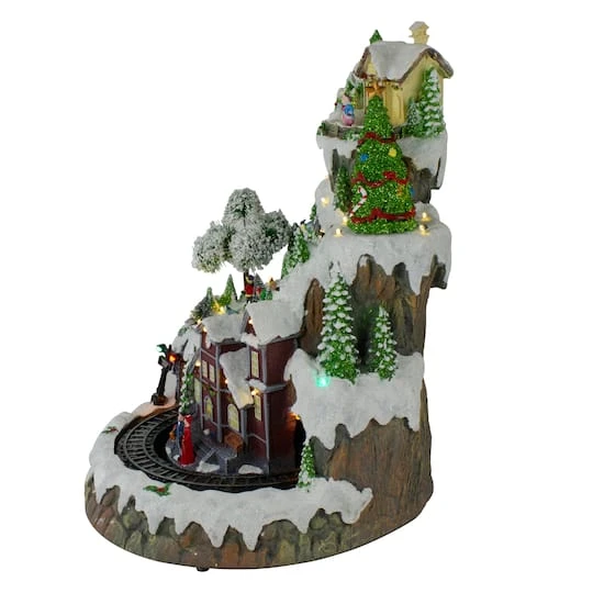 Northlight 17" White LED Lighted & Animated Christmas Village With Moving Train 7 Northlight 17" White LED Lighted & Animated Christmas Village With Moving Train - Image 5